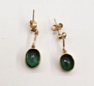 Pair gold-coloured metal and green tourmaline pendant drop earrings set oval stones