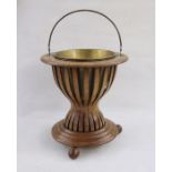 Georgian style mahogany and satinwood strung jardiniere of circular form with brass loop handle,