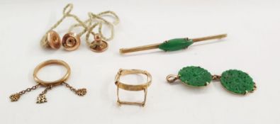 Gold bar brooch set with oval jade plaque, marked 15ct, a gold-coloured pendant set with two pierced