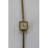 Lady’s Rotary 9ct gold wristwatch having square dial with baton numerals and the flexible mesh