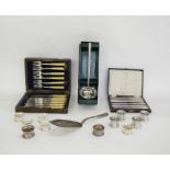 Silver-plated fish server, assorted napkin rings in stainless steel and EPNS, a Viners stainless