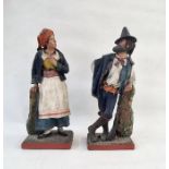 Pair of Italian papiermache figures in traditional dress of a woman and a man, 34cm and 36cm high (