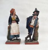 Pair of Italian papiermache figures in traditional dress of a woman and a man, 34cm and 36cm high (