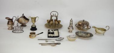 Assorted silver-plated items to include a plated boiled egg breakfast set, a sugar shaker, a sugar