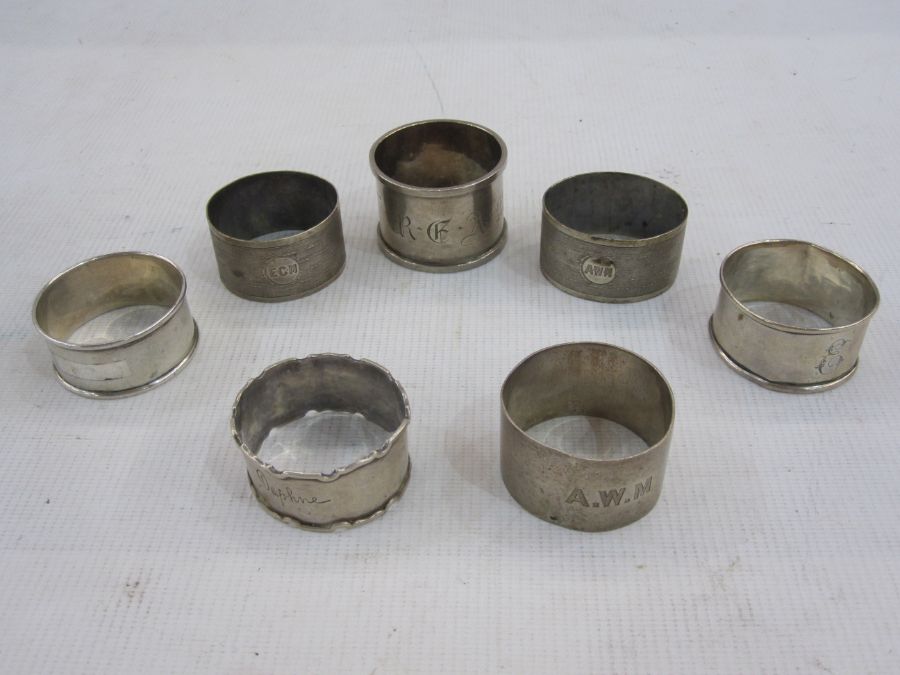 Seven assorted silver napkin rings, approx. total weight 4ozs