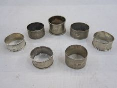 Seven assorted silver napkin rings, approx. total weight 4ozs