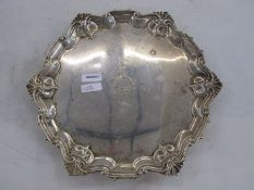 Edwardian silver salver by William Hutton & Sons, London 1901 of shaped circular form on three