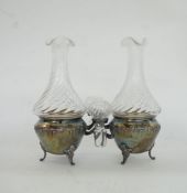 French silver and glass oil and vinegar stand, the glass bottles with wrythen flared bodies, the