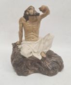 Chinese porcelain and partly glazed model of a seated mudman (Li Tieguai), one of the eight