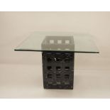 Modern coffee table, the square glass top on black marble base of four sides with pierced square