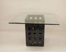 Modern coffee table, the square glass top on black marble base of four sides with pierced square