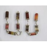 Silver-mounted agate bar part necklace, each link panelled bar to include various striped agate