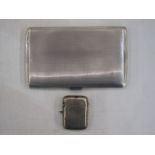 Engine-turned silver cigarette case by Asprey, London 1963 and a silver vesta case engraved with