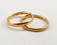 Two 22ct gold wedding rings (finger sizes K and L1/2), total weight approx. 5g (2)