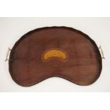 19th century mahogany kidney-shaped tray with conch shell inlay, galleried top and brass handles,