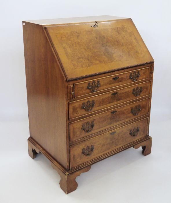 20th century burr walnut mahogany cross-banded and feather strung bureau, the interior with fitted