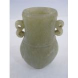 Chinese carved jade baluster vase of flattened form, having pair S-scroll handles and the body