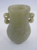 Chinese carved jade baluster vase of flattened form, having pair S-scroll handles and the body