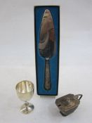 Cake slice with queens pattern silver-cased handle, a silver mustard pot with blue glass liner and a