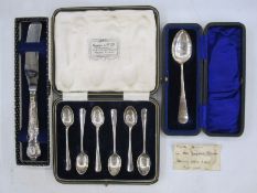 Set of six rattail pattern coffee spoons in fitted case, a silver christening spoon in fitted case