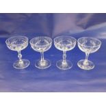 Nine various 1920's and 30's cut saucer champagne glasses