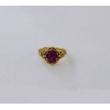 Antique gold-coloured metal and pink tourmaline-coloured stone ring with foliate shank Condition