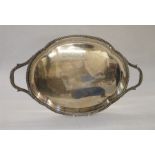 Silver tray, shaped oval with gadrooned border, gadrooned and foliate handle, 46cm wide x 28cm,