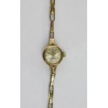 Lady's 9ct gold Rotary 21-jewel wristwatch with baton numerals and expanding 9ct gold bracelet,