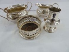 WITHDRAWN   EPNS wine coaster, an EPNS sugar bowl and matching cream jug, a set of six pairs of