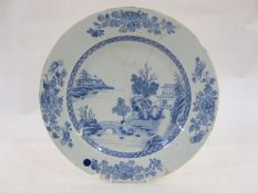Chinese porcelain plaque, underglaze blue lakeside landscape painted decoration, 36cm diameter (