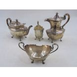 Mid 20th century four piece silver tea service, comprising teapot, hot water pot, sugar bowl and