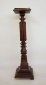 Late 19th/early 20th century mahogany aspidistra stand, the square top with moulded edge above