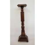 Late 19th/early 20th century mahogany aspidistra stand, the square top with moulded edge above