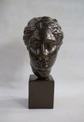 Modern ceramic sculpture of a Roman head, on square plinth (tiny chip on the back of the head)