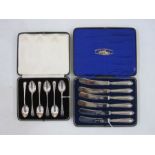 Set of six silver fruit knives with silver overlay handles, a set of six silver tea spoons,