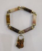 Gold-coloured metal agate bar bracelet, the panelled agate bars in various cream and brown