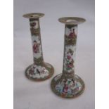 Pair of 19th century Chinese Canton porcelain table candlesticks, each with figures, birds and