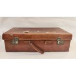 Vintage leather suitcase with some torn travel labels and another, smaller (2)