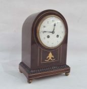 Late 19th/early 20th century mahogany and brass inlaid mantel clock, the case of domed form, the