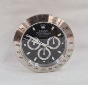 WITHDRAWN Modern wall clock in the form of a Rolex Oyster Perpetual Daytona wristwatch, 33cm