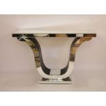 Modern mirrored console table in the Art Deco taste, the rectangular top on shaped supports to