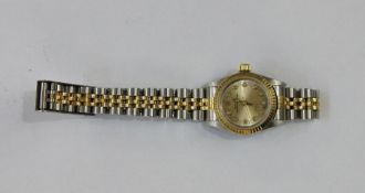 Lady's Rolex Oyster Perpetual stainless steel and gilt metal wristwatch, the dial set tiny diamonds,