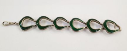 Silver and green enamel shaped horseshoe link bracelet Condition ReportThe condition is good, no