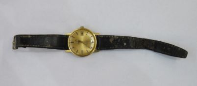 Gent's Omega automatic wristwatch, gold-coloured, with baton numerals and calendar aperture and
