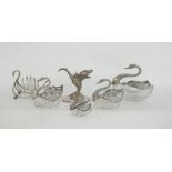 Set of four silver and cut glass swan bowls, each with cut glass base, silver swan neck and
