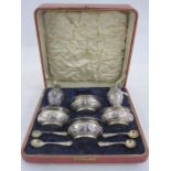 Late Victorian part six piece silver condiment set decorated ribbon ties and swags, Birmingham 1899,