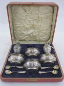 Late Victorian part six piece silver condiment set decorated ribbon ties and swags, Birmingham 1899,