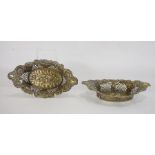 Pair of silver-plated sweetmeat dishes with pierced decoration, cherubs on the base (copper