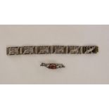 Silver-coloured metal dove of peace panelled bracelet and a silver-coloured metal and amber bar