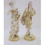 Pair 19th century Sitzendorf gilt porcelain figures of lady and gentleman, the lady carrying